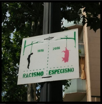 19 05 Especismo hombre linchado cerdo colgado.jpg