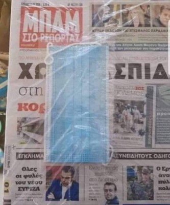 Regalan mascarilla periodico Grecia 19 abril.jpg
